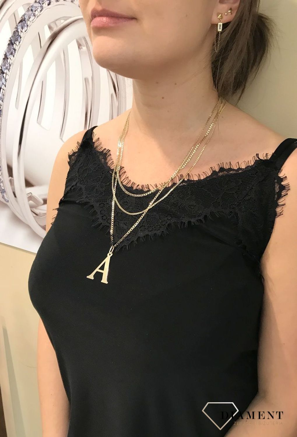 Złota zawieszka w kształcie litery A, wykonana z wysokiej jakości złota próby 585..jpg